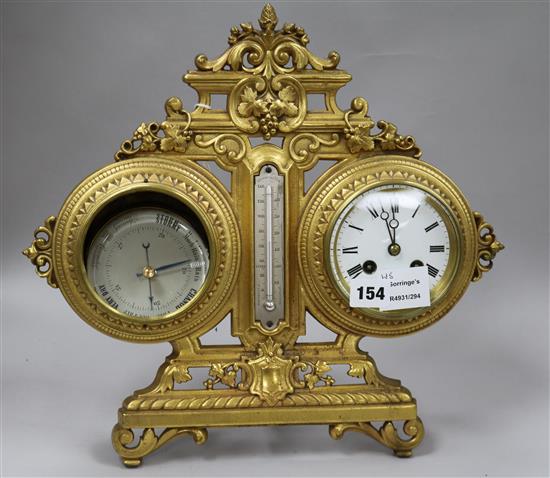 An Edwardian gilt brass combined desk timepiece, thermometer and barometer, height 36cm